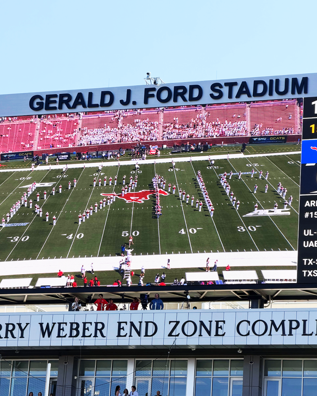 SMU Mustang Band formation displayed at Gerald J. Ford Stadium